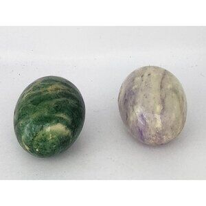 alabaster or marble decorative eggs.